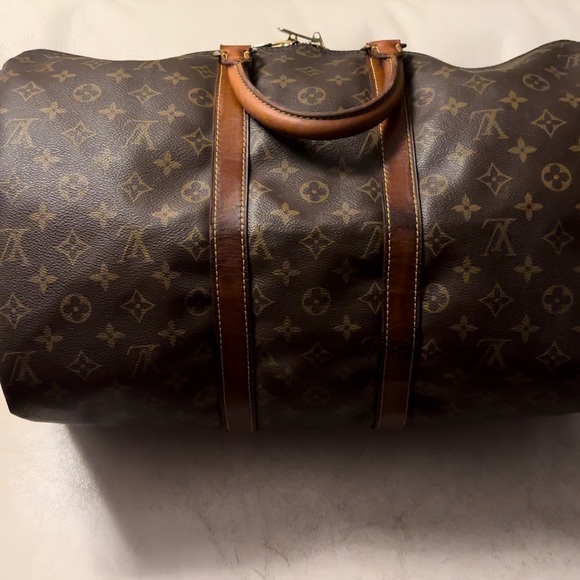 Authentic Louis Vuitton travel bag - Picture 16 of 16